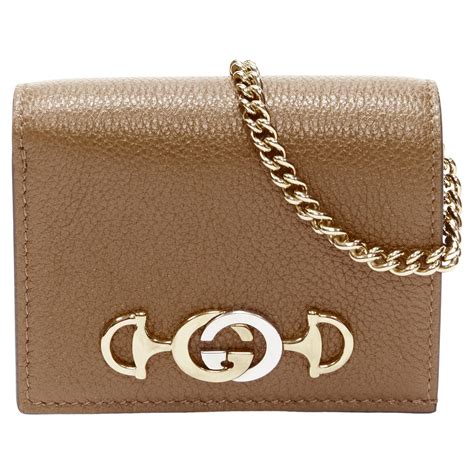 gucci zumi woc|gucci gg marmont wallet on chain.